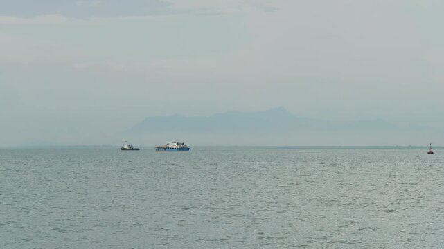 day time penang island george town bay boat traffic mountain view panorama 4k malaysia