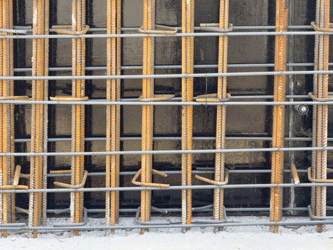 View of steel reinforcement bars and rebar mesh installed for concrete foundation at a construction site Sariyer, Istanbul, Turkiye.