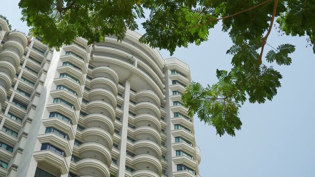 sunny day penang island george town modern apartment building balcony front up view slow motion panorama 4k malaysia