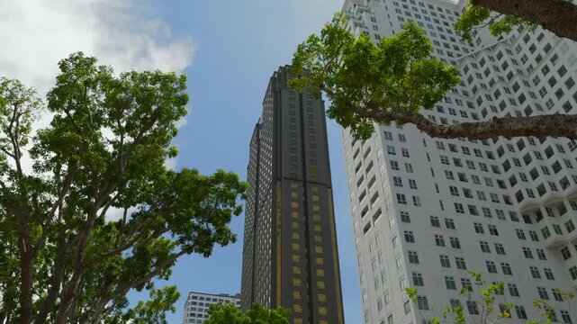 sunny day penang island george town modern building exterior up view slow motion panorama 4k malaysia