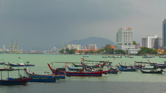 day time storm sky penang island george town industrial boat dock bay slow motion panorama 4k malaysia 