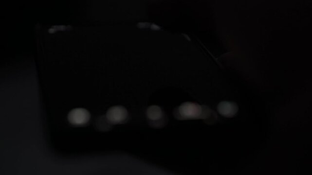 Blurred Smartphone Scrolling and Content Consumption Close Up