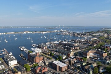 Fototapeta premium Newport, Rhode Island, USA - aerial view of harbor, sailboats and Claiborne Pell Bridge on a clear day. g.