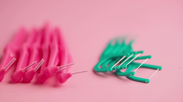 Assortment of Colorful Toothbrushes, Interdental Brushes, and Dental Floss Picks