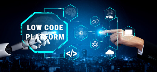Fototapeta premium Futuristic Collaboration between Human and Robot on Low Code Platform Technology for Creative Development and Efficient Solutions in a Digital Environment Quark.