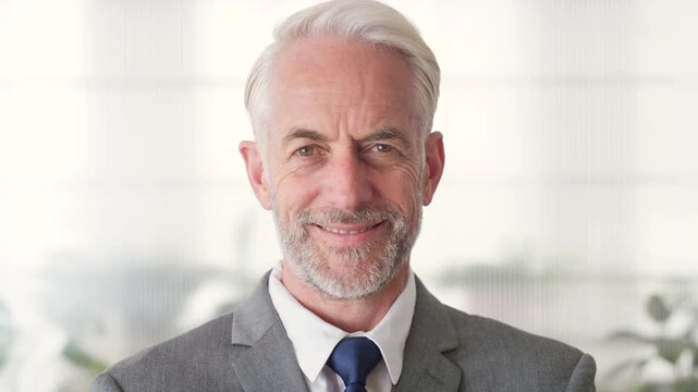 Face, mature and businessman with smile in office, legal consultant career and client representative. Portrait, professional and lawyer with confidence for litigation support, law firm and advocate