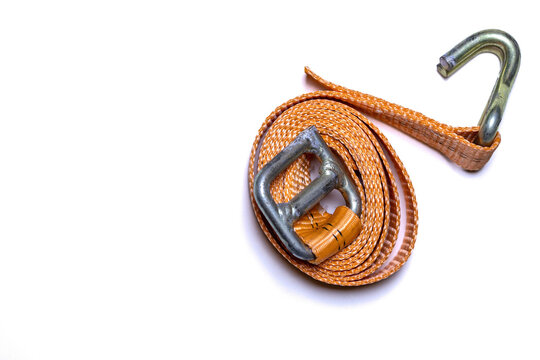 Off-road vehicle recovery equipment featuring a high-visibility orange kinetic snatch strap on a clean background.
