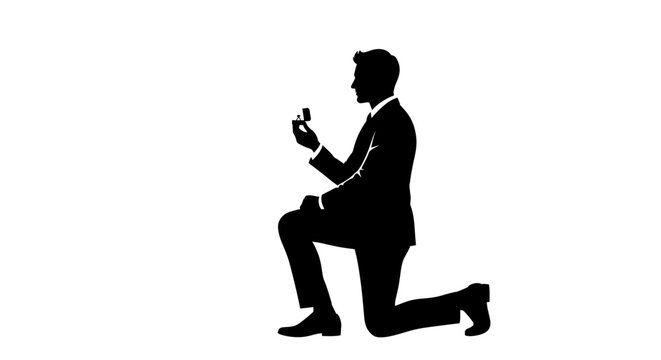 Man kneeling down proposing with a ring