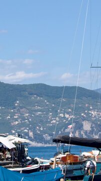Scenic Harbor View of Pastel Buildings and Luxury Yachts in Portofino