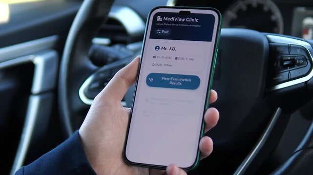 Modern user accessing electronic health records on the go. Viewing rib and spinal fracture reports from a clinic on a smartphone. Perfect for videos about modern healthcare accessibility and digital