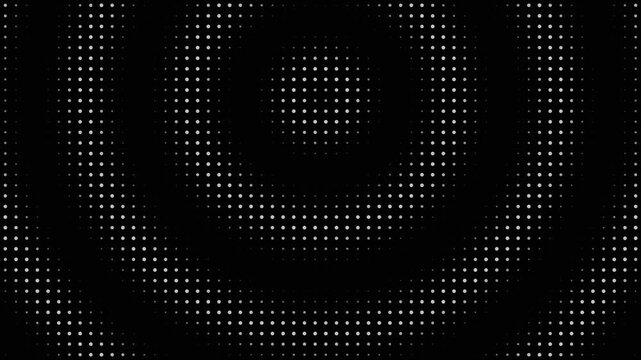 White halftone dot pattern forming concentric circles on black