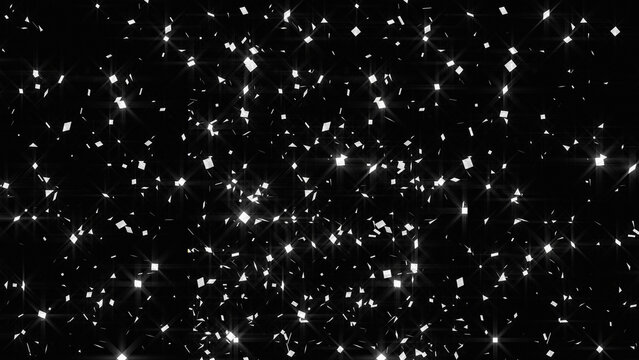 Glittering silver confetti falling on black background, shimmering metallic sparkles for celebration, festive glowing star dust texture