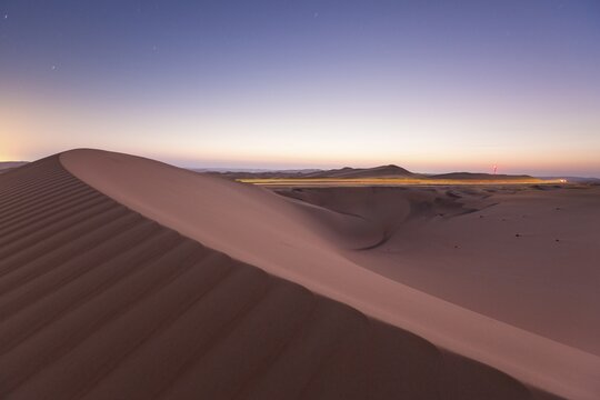 Sand dunes in desert, sunrise, Rub' al Khali or Empty Quarter United Arab Emirates