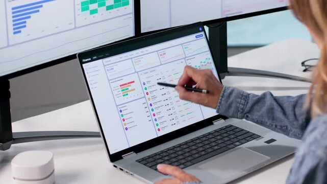 Experienced Finance Manager Analyzing Corporate Cashflow Data