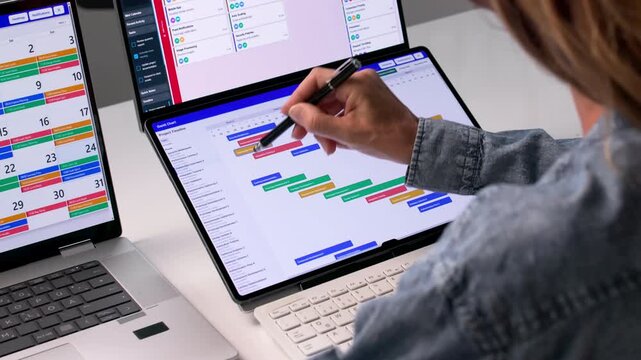 Agile Project Manager Reviews Calendar And Updates Task List