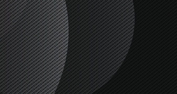 Close-up of Carbon Fiber Material with Textured Pattern.