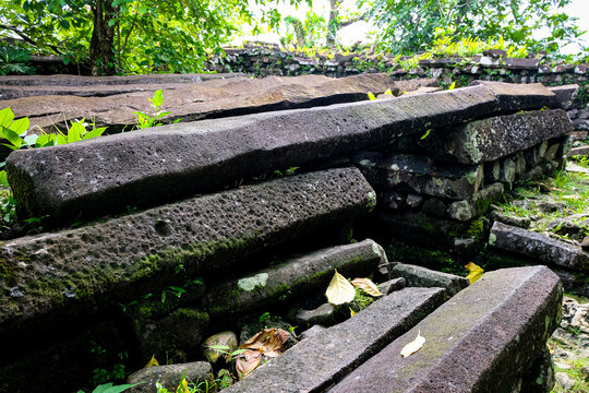Ancient basalt and coral monument inside Nan Madol archaeological site in Madolenihmw district of Pohnpei, Federated States of Micronesia