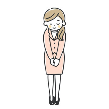 お辞儀するスーツの女性