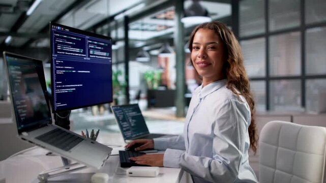 Young Woman Coder Happily Working