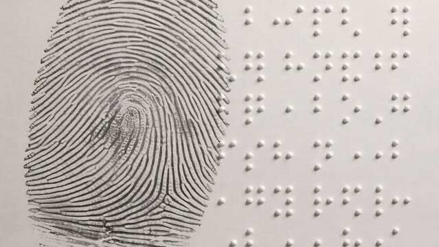 Close-up of a fingerprint and binary code with fingerprint identity security
