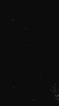 Vintage 16mm film texture doodle dust grain overlay. Dynamic film rolling effect. 16mm, 35mm tape texture. Vertical video