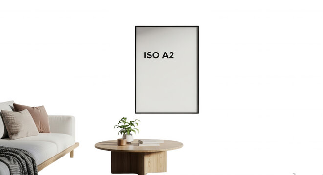 Vertical iso a2 blank poster frame mockup hanging on a solid black wall above a wooden coffee table and white sofa in a room