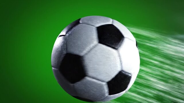 A soccer ball in motion with a green background.