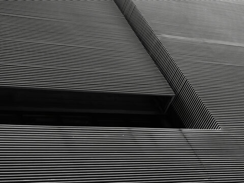 Modern building Exterior Grey Facade line pattern Architecture details Monochrome