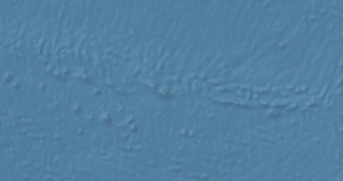 Pitcairn Islands on Globe. Zoom into the country with Earth spinning on dark background. Physical world map with Pitcairn Islands and label on it. Country view animation.