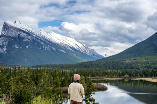 Woman viewing Vermillion Lakes and Mount Rundle in Banff National Park
