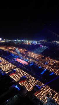 Ayodhya, India - 30 October 2024: Aerial view of the massive Deepotsav festival with thousands of oil lamps lighting up the river ghats at night.