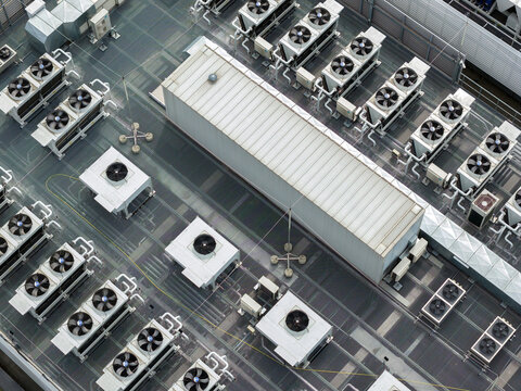Aerial view of industrial cooling systems and HVAC units on the rooftop of the AI data center in Warsaw, Mazowieckie, Poland.