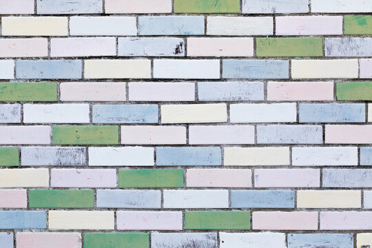 Pastel colored brick wall texture background with vintage pattern