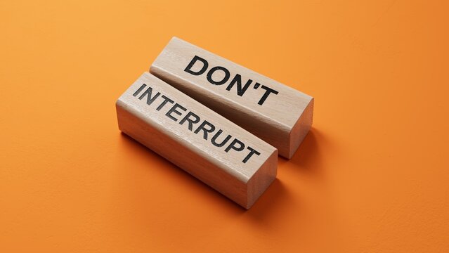 Don't interrupt symbol. Concept word Dont interrupt on wooden blocks. Business and Dont interrupt concept. Copy space.3D rendering