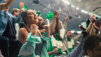 Obraz premium Portrait of a Happy White Female Supporter Raising Fists and Cheering for Her Team at a Soccer Football Championship Match, Excited Diverse Fans in a Stadium Celebrating a Score During a Game.