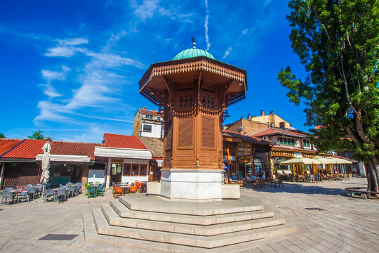 Historical Sebilj fountain in the center of Bascarsija square under a blue sunny sky in Sarajevo