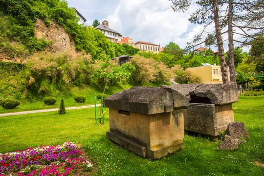 Ancient medieval stecak monumental tombstone in a green park of Jajce, Bosnia and Herzegovina