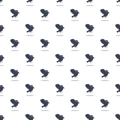 Naklejka premium Black raven birds forming a repeating pattern on a white background