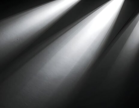 Spotlights shining in dark room.