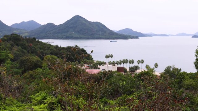 Rabbit Island, Japan, Okunoshima Island landscape, Seto Inland Sea, Takehara, Hiroshima Prefecture, Setonaikai National Park, with beach, lighthouse, museum and ruins, Japan, ferry trip to Okunojima