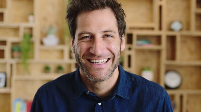 Face, teacher or happy man with laugh in study for education, learning or development. Portrait, male person or professor with smile of funny academic tutor for creative growth, career or language