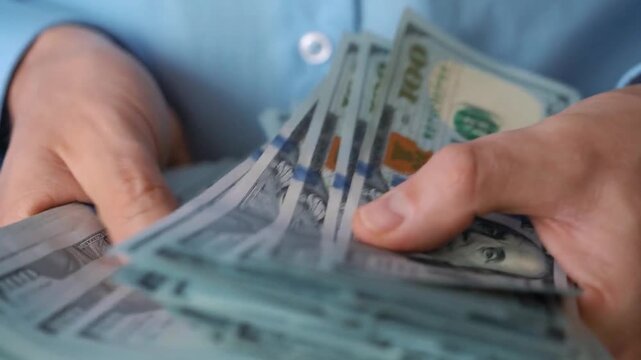 successful business man woman hand counting money businessman entrepreneur income salary prize. stack dollar bills bank. 100 banknote. rich wealthy accountant win winner cash wage. Finance investment