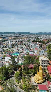 Vertical Video Da Lat Vietnam Aerial City and Temple Complex