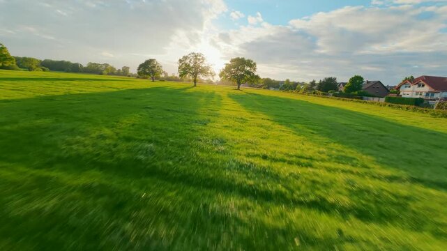 FPV drone flight through a rural field