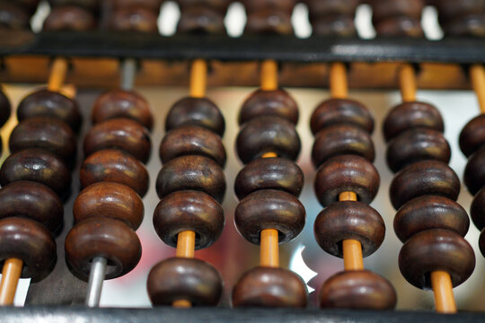 Close-up view of traditional Chinese abacus beads
