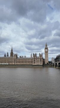 Looking across the River Thames to the Houses of Parliament. The Palace of Westminster is in the centre of the shot, with the Elizabeth Tower housing Big Ben to to the right.