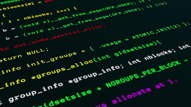 Close up view of digital computer screen tracking encrypted software development syntax and cyber hacker data.