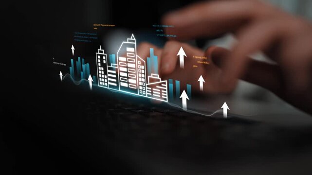 Hands typing on a laptop with digital graphics of city buildings and arrow indicators representing growth and development in technology and business Gluon.