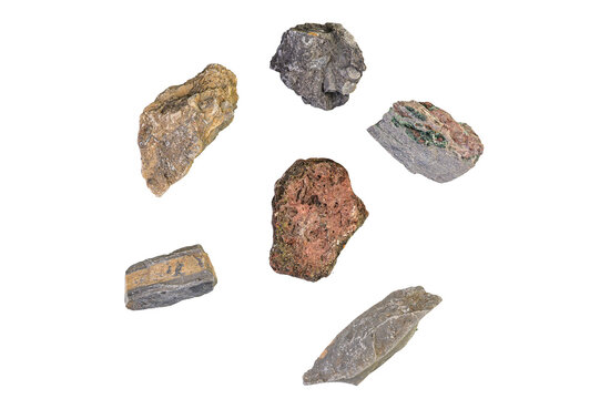 Collection of diverse mineral and rock samples on a clean white background