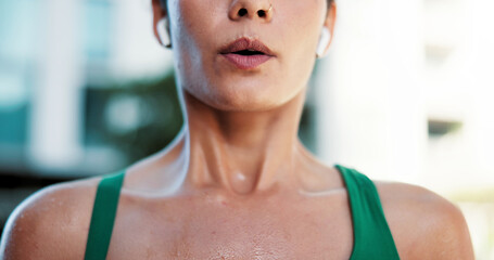 Obraz premium Fitness, breathing and mouth of woman in city for fatigue, exercise and burnout for cardio training. Exhale, tired and female person in town with exhaustion, sweating and recovery for challenge.